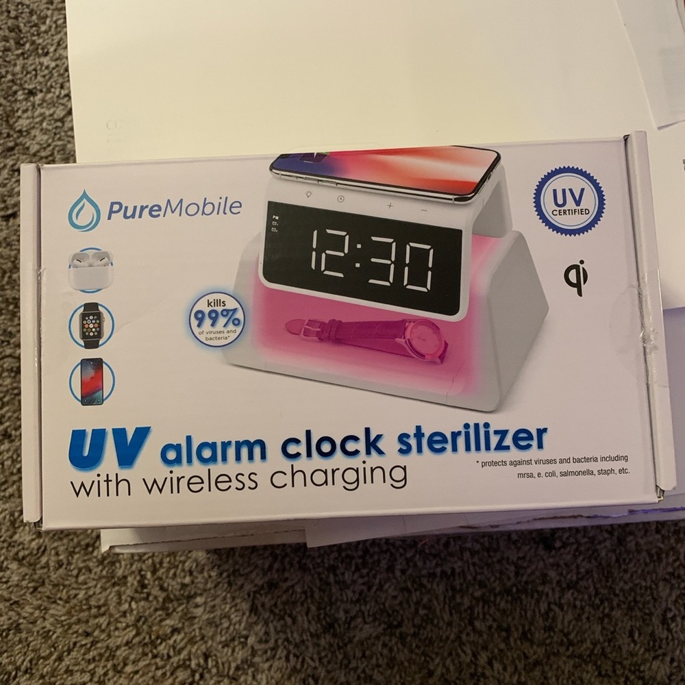 PureMobile UV wireless charger and sanitizer. New,opened box, never used